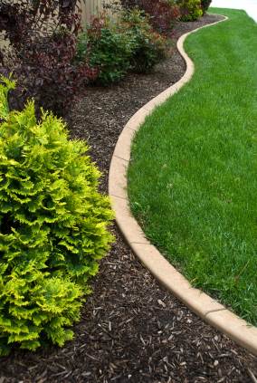Landscape edging by Wild West Landscape Designs LLC.